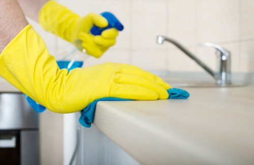 Professional Enfield carpet cleaners treating a stained carpet surface