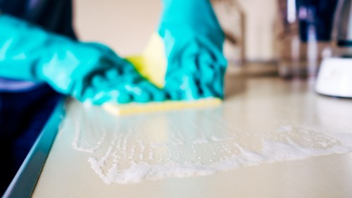 Steam carpet cleaning in Enfield removing stains from a busy hallway carpet