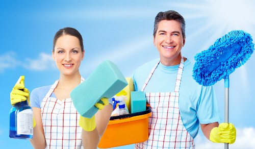 Carpet cleaning staff carrying out a safety check before starting work